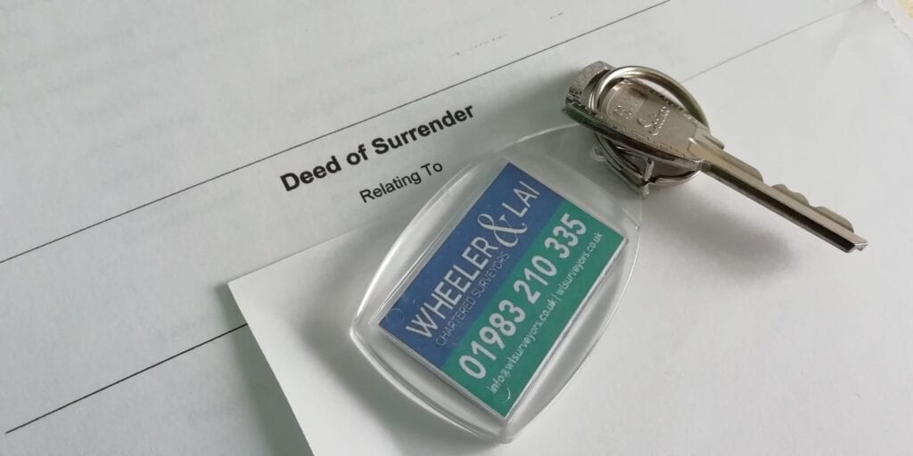 Lease surrender document with a set of keys returned.